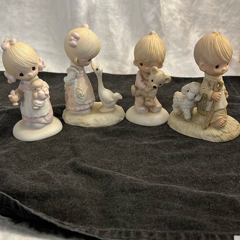 Precious Moments- 4 of the original 21 - all retired.